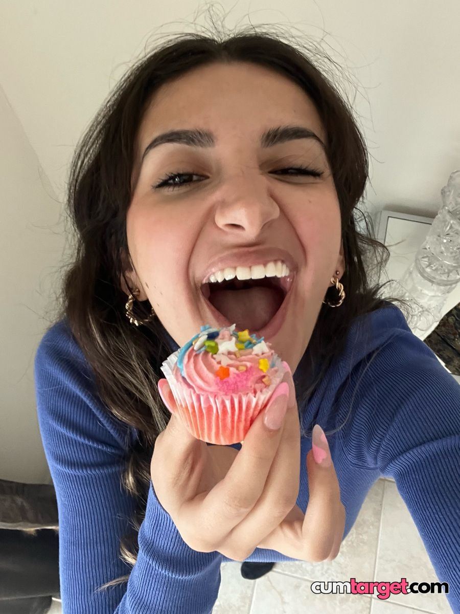 Cum On Woman Enjoying Colorful Cupcake
