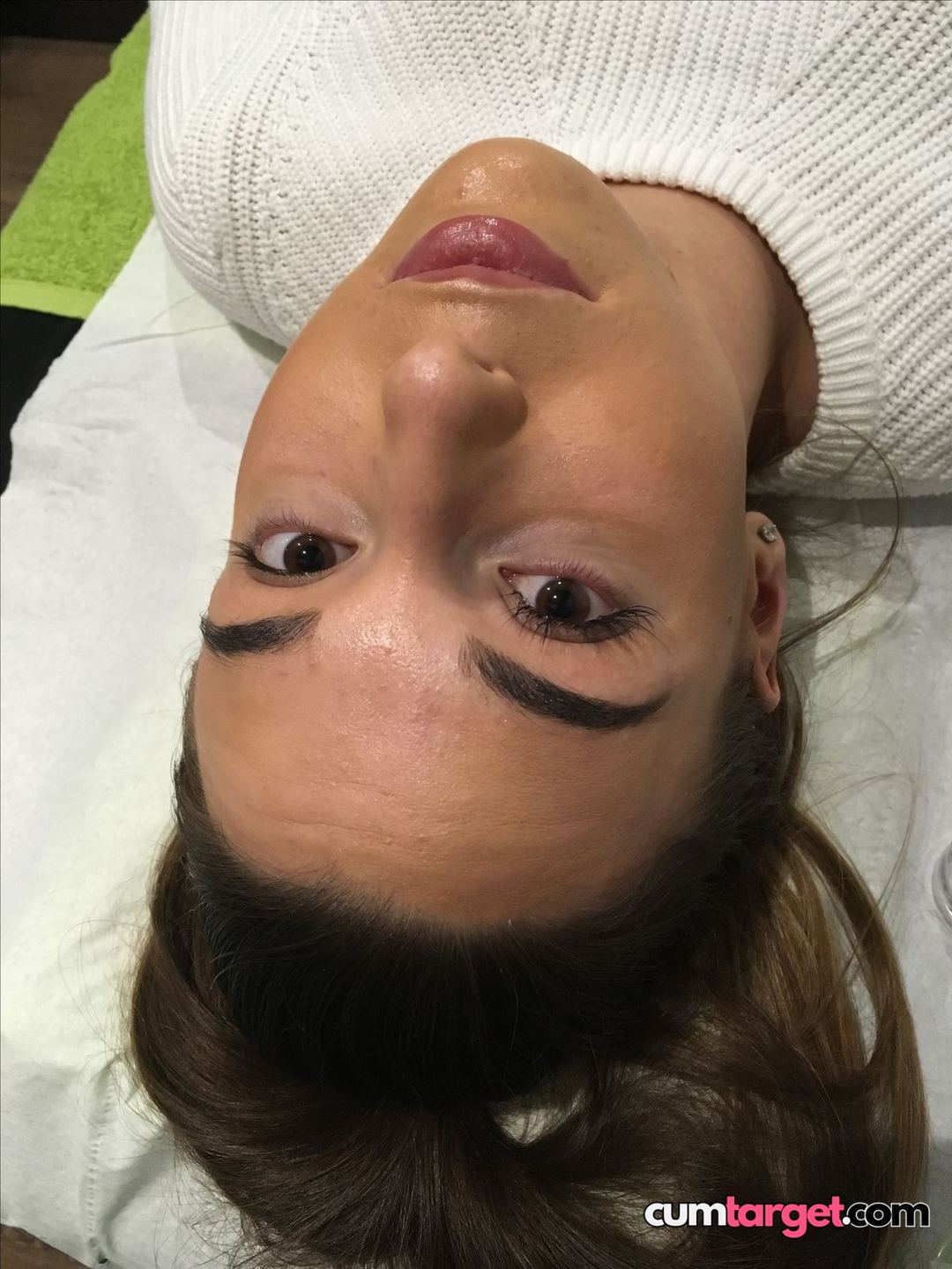 Spray on Woman Lying Down Close-Up