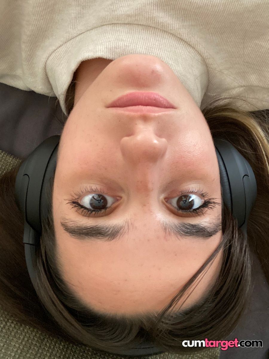 Spray on Close-up of Woman Wearing Headphones