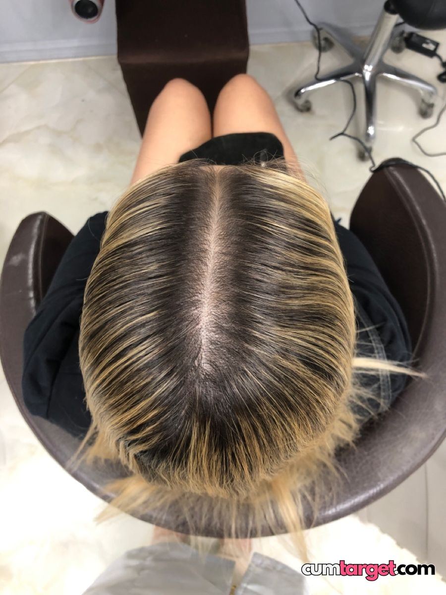 Spray on Top View of Blonde Hair