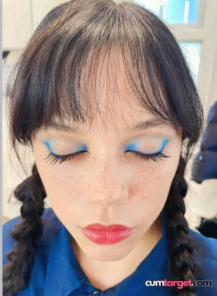 Cum On Close-up of Woman with Blue Eyeliner