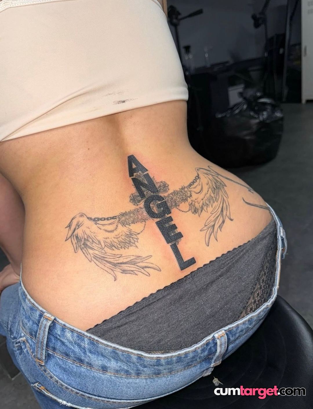 Cum Target Lower Back Tattoo Display