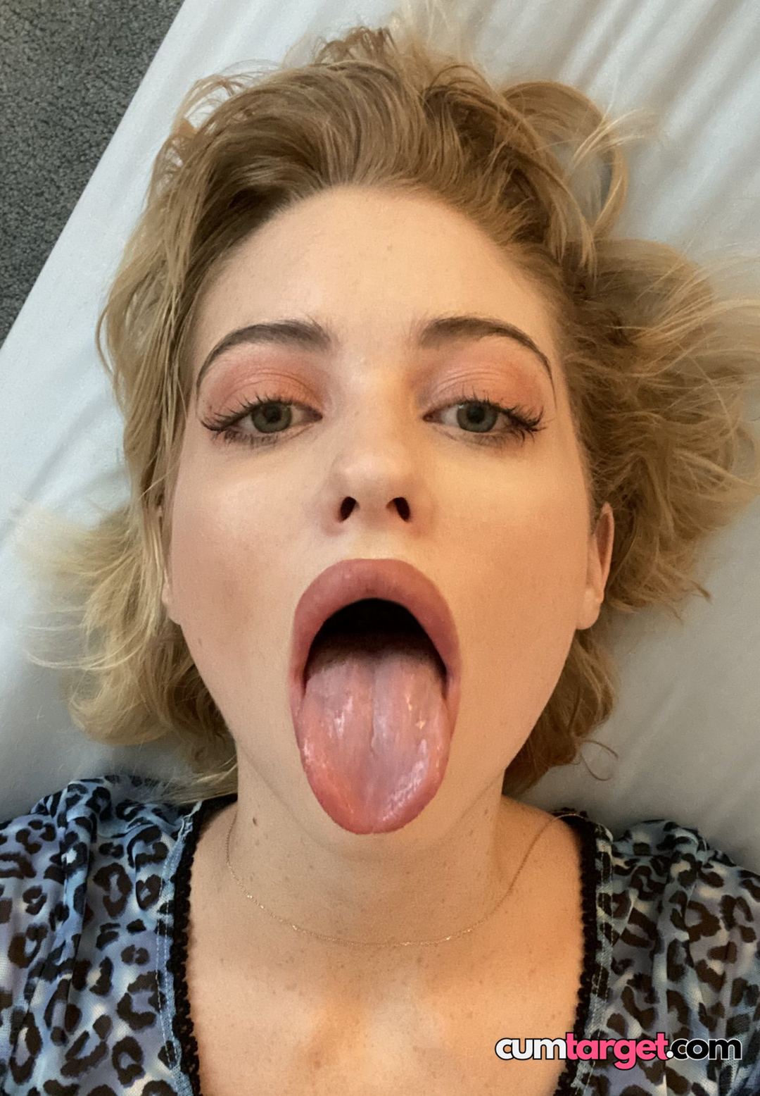 Cum Target Woman Sticking Out Tongue