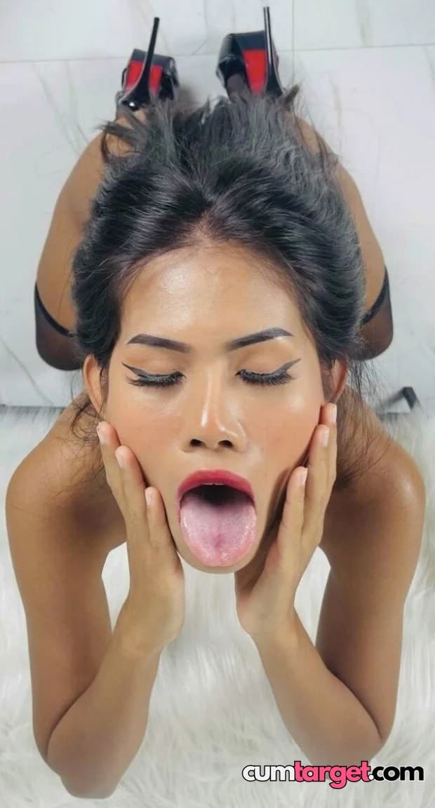 Cum On Woman Posing with Tongue Out