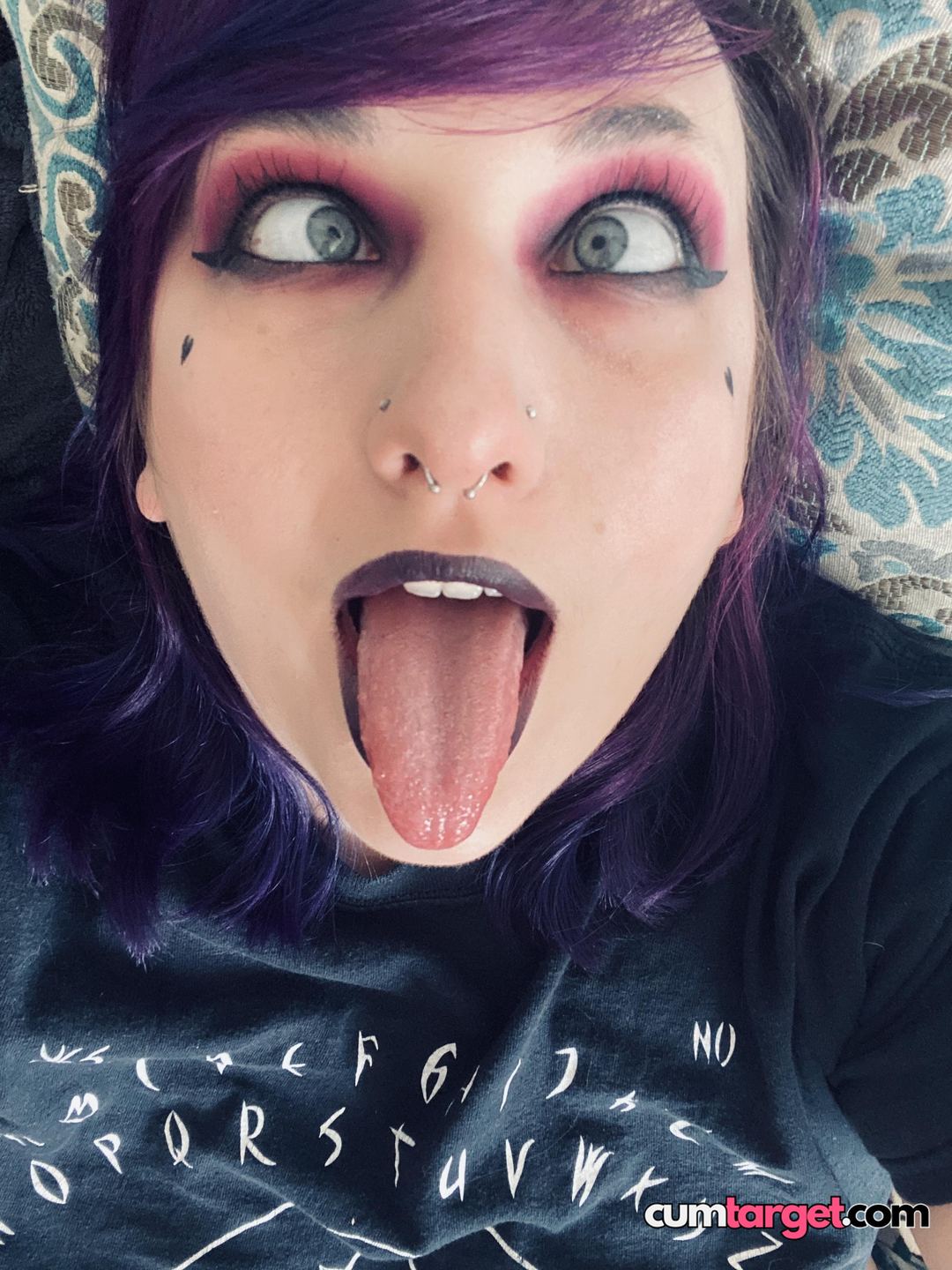 Spray on Playful Face with Tongue Out