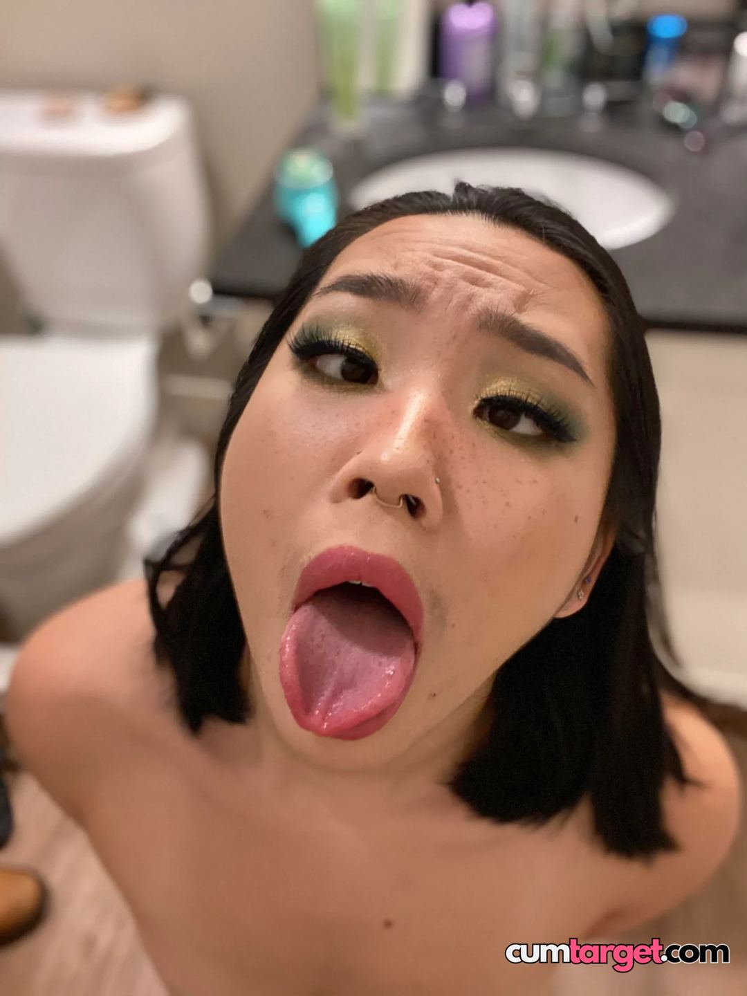 Spray on Woman Sticking Out Tongue