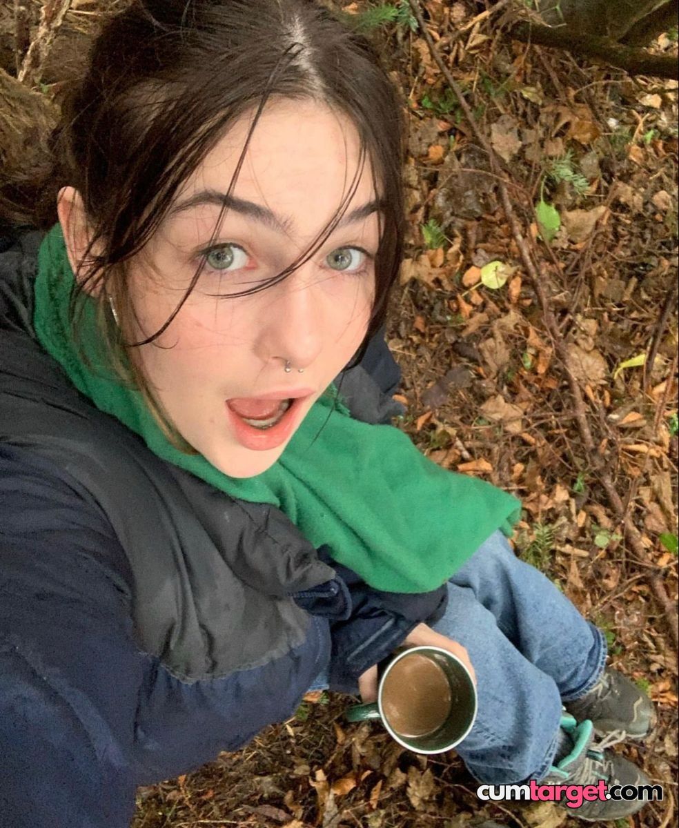 Spray on Surprised Woman Outdoors
