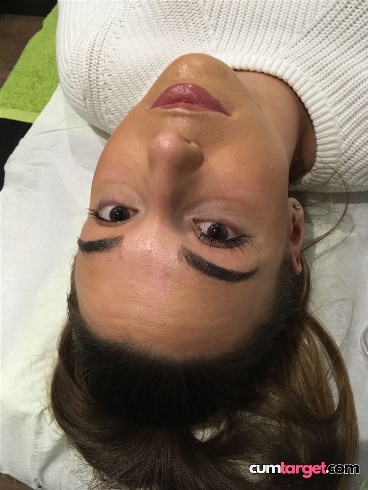 Spray on Woman Lying Down Close-Up