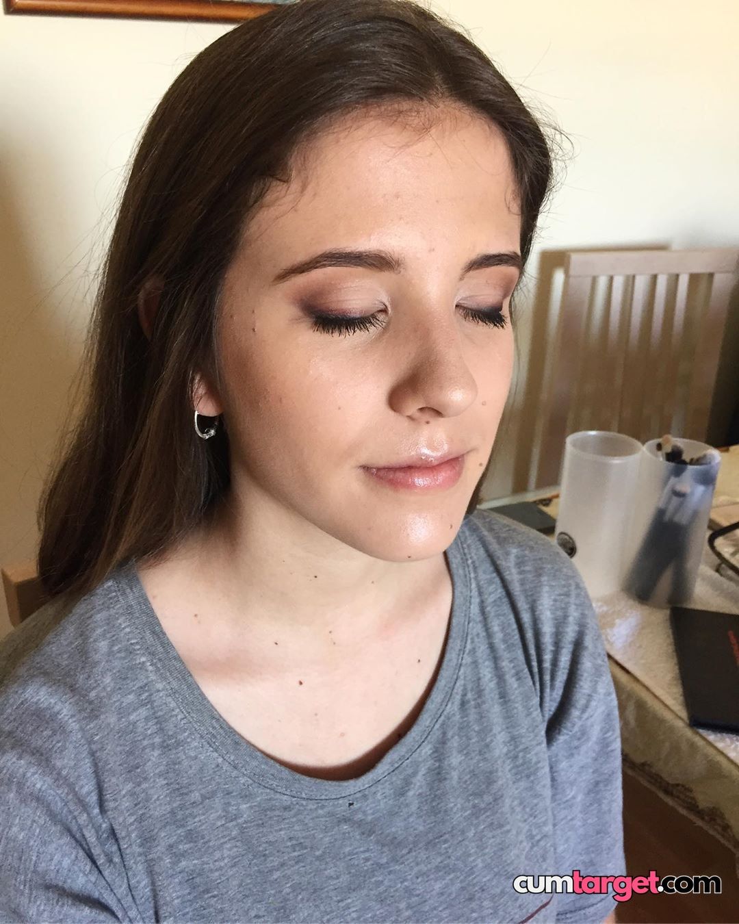 Spray on Peaceful Woman with Closed Eyes