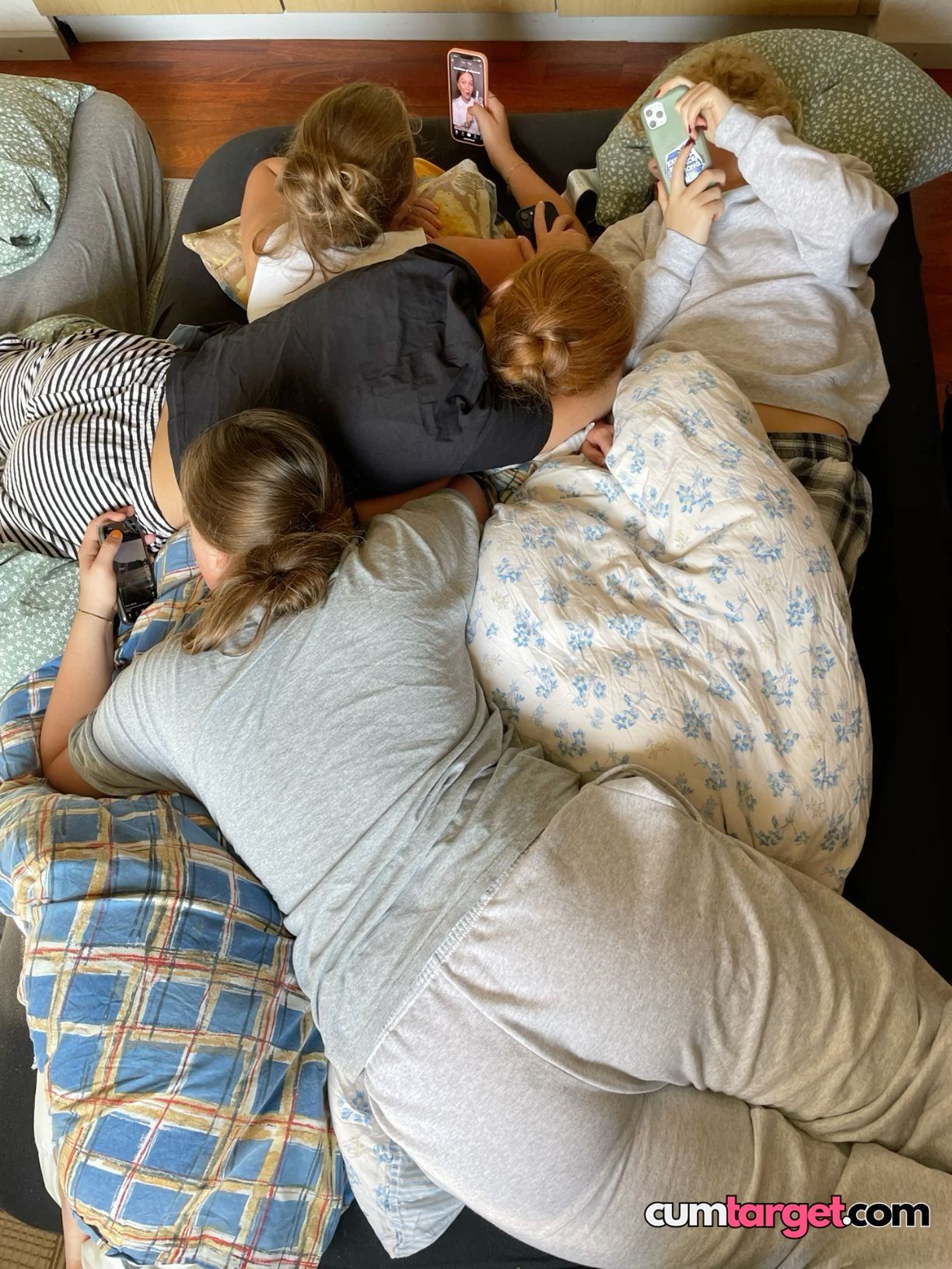 Spray on Friends Relaxing with Phones