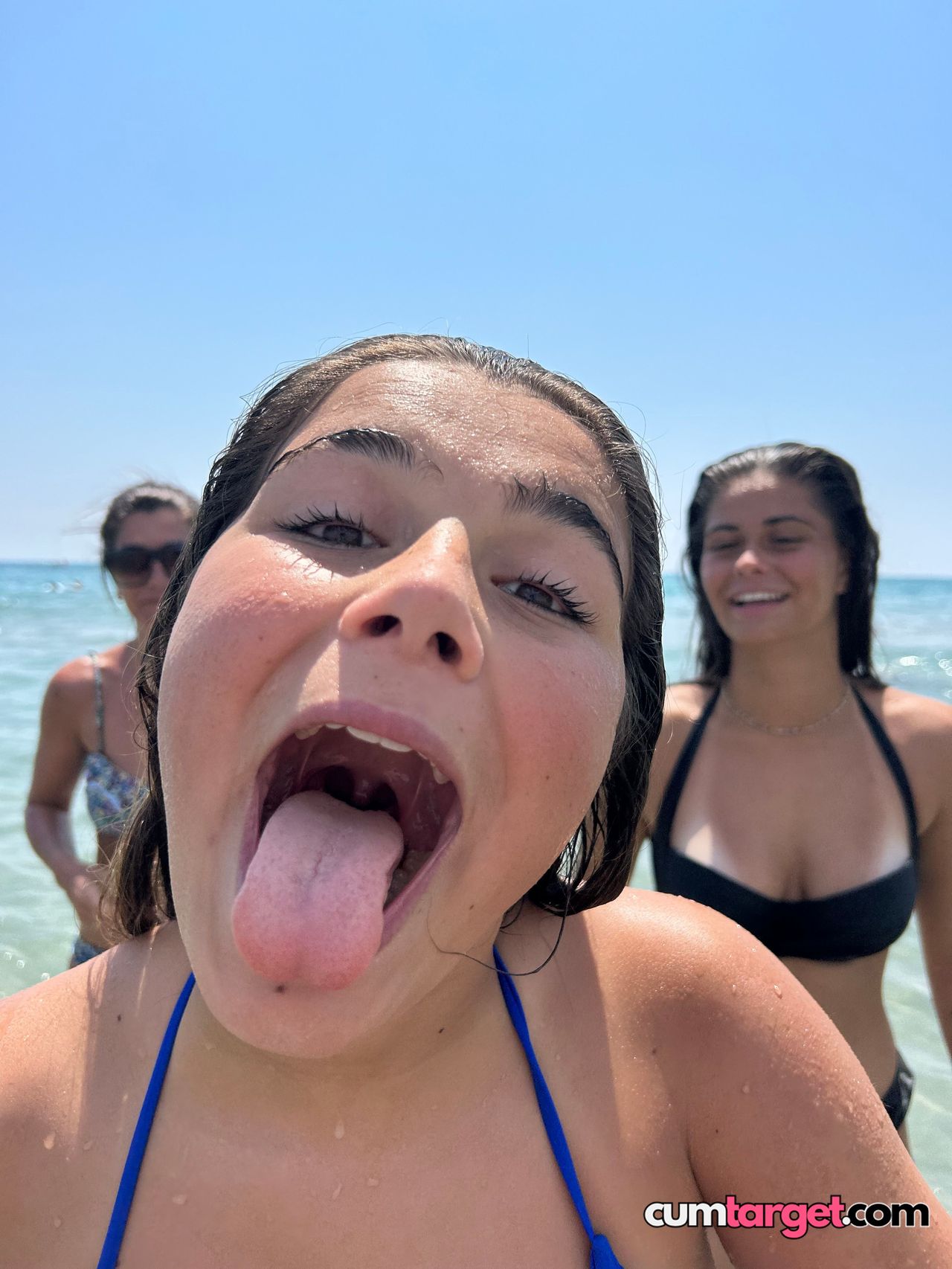 Spray on Playful Beach Selfie