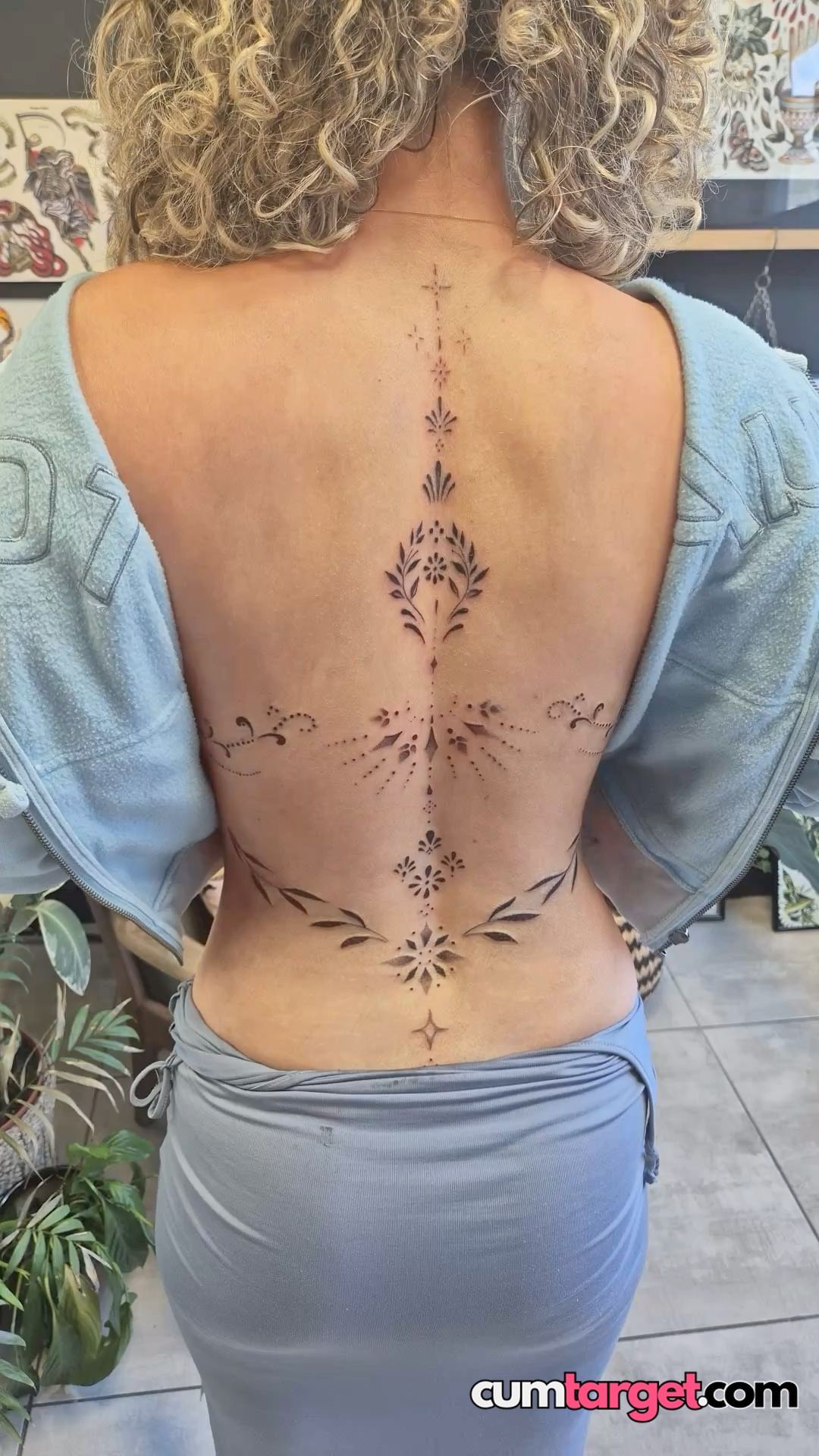 Cum Target Intricate Back Tattoo Art