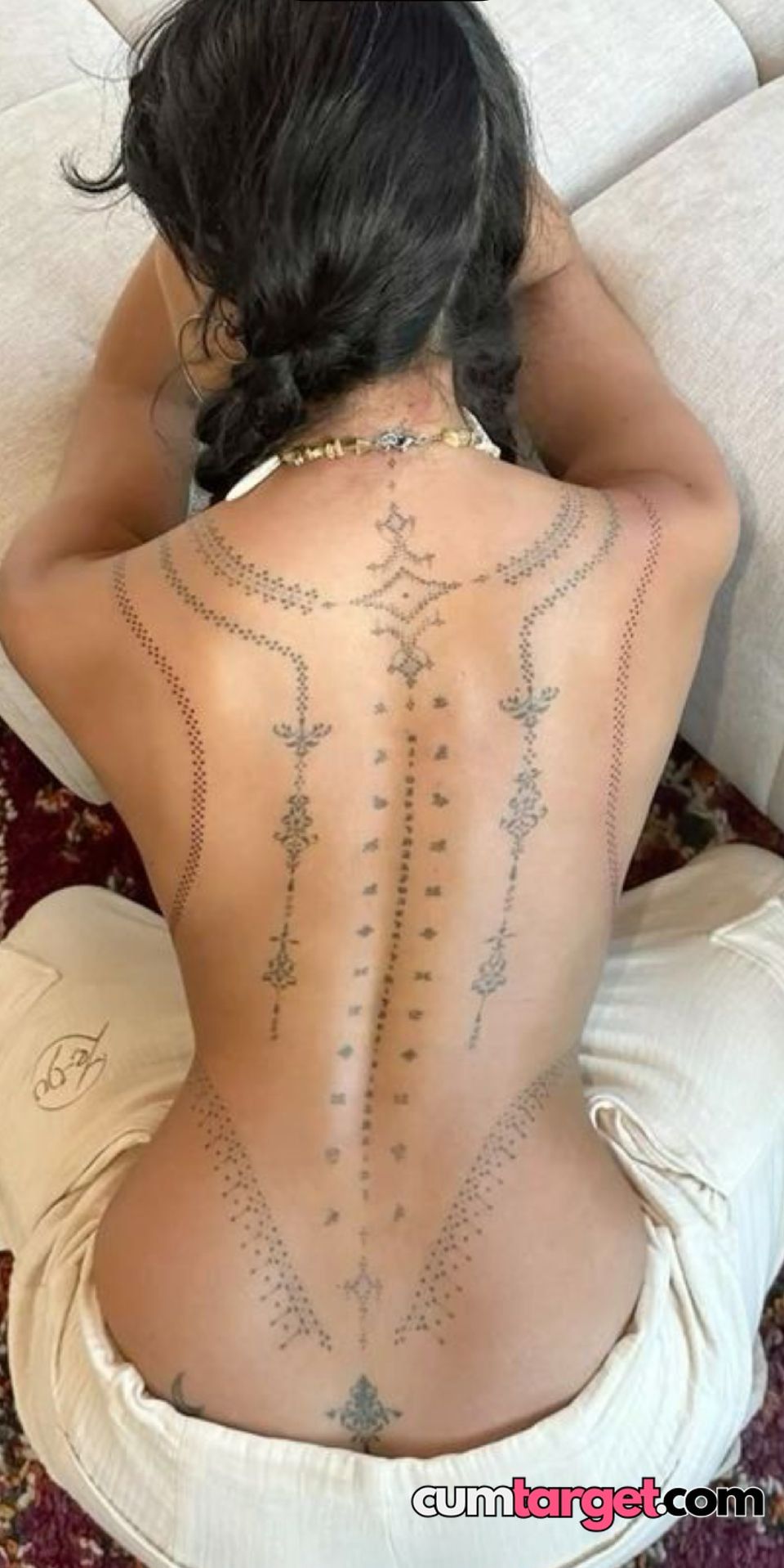 Spray on Intricate Back Tattoo Art