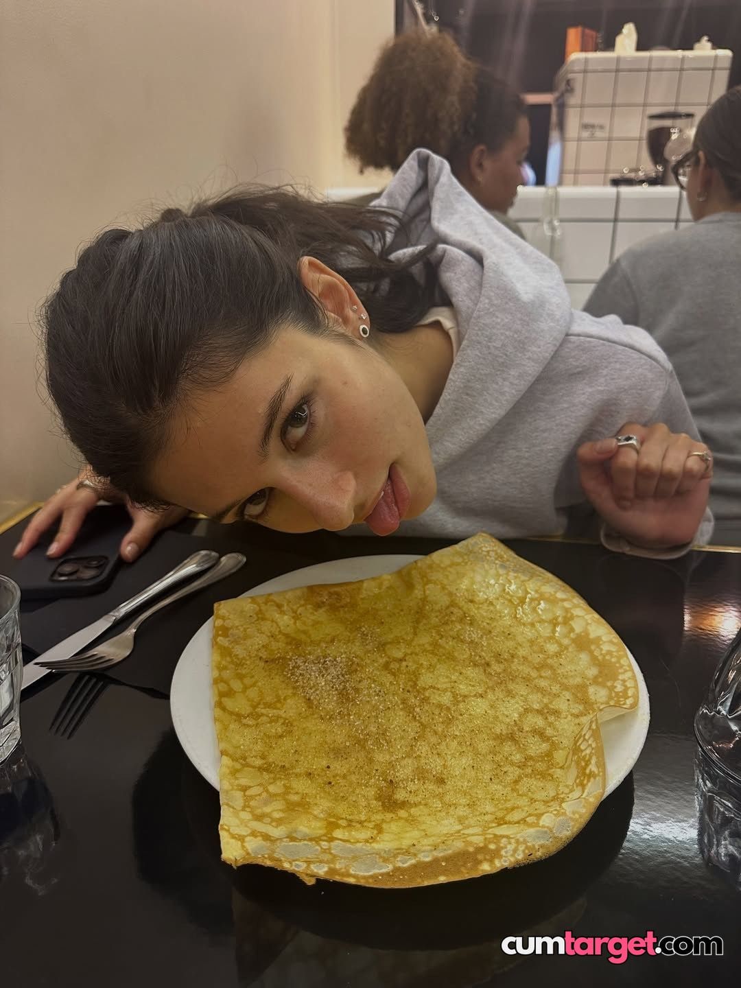 Target Woman Playfully Licking Pancake