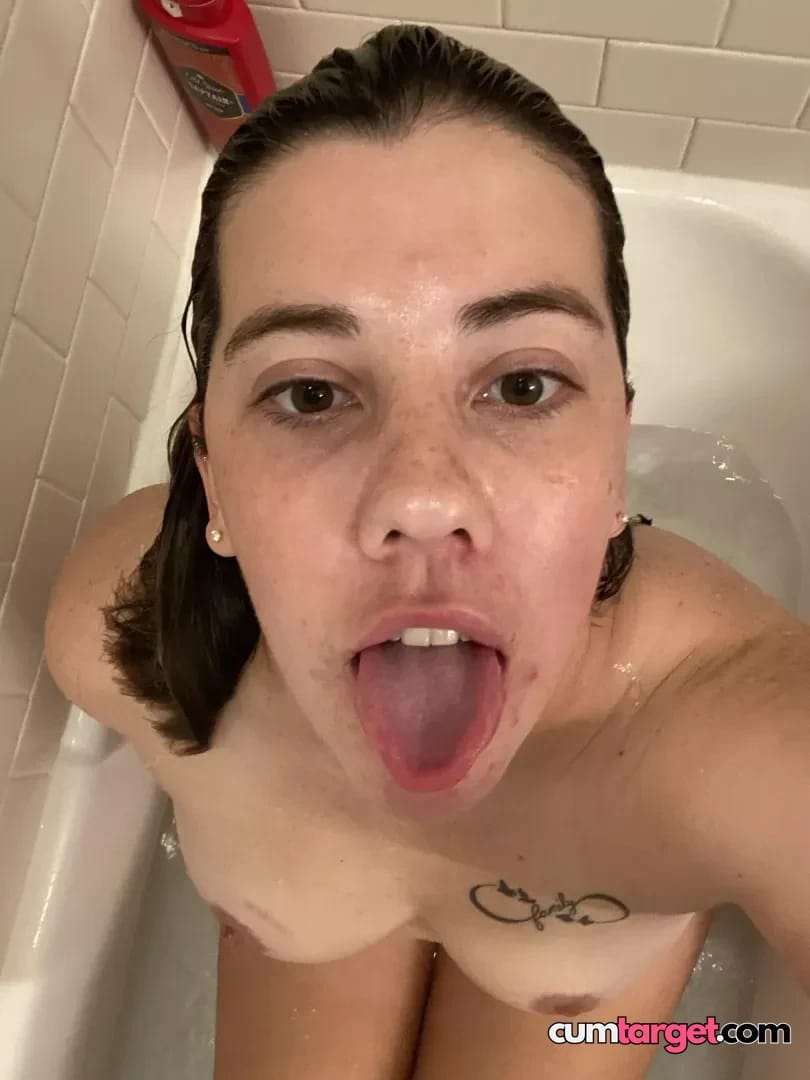 Cum Target Woman in Bathtub Sticking Tongue Out