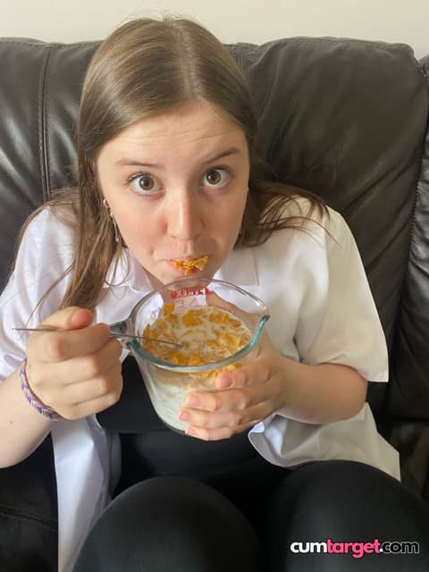 Wait for you Girl Eating Cereal on Couch