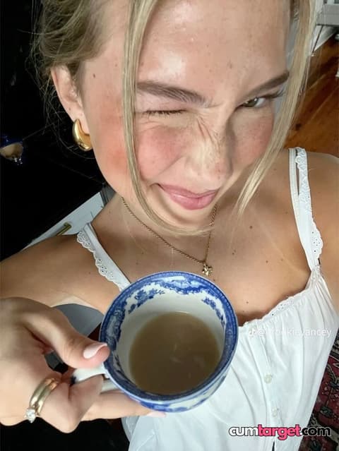 Target Winking Woman Holding Tea Cup