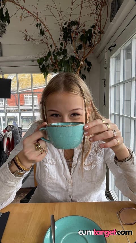 Target Smiling Woman Enjoying Coffee