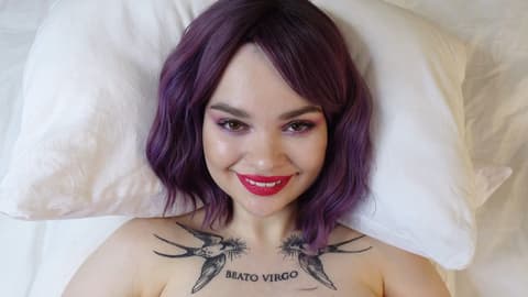Smiling Woman with Purple Hair