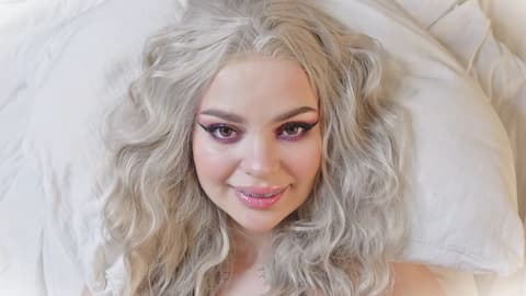 Smiling Woman with Curly Hair