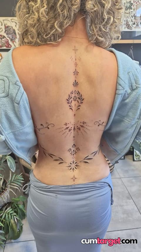 Cum Target Intricate Back Tattoo Art