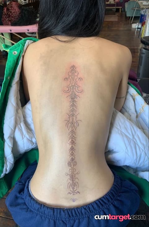 Waiting for Cum Intricate Spine Tattoo