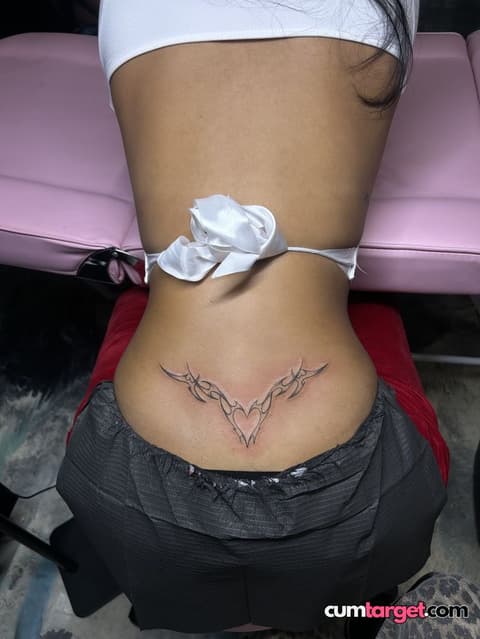 Cum On Lower Back Tribal Tattoo