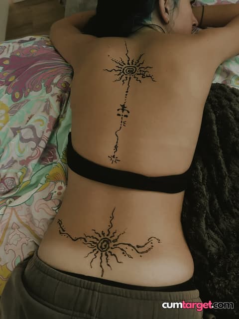 Spray on Relaxing with Back Tattoos