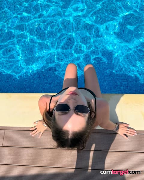 Spray on Relaxing by the Pool