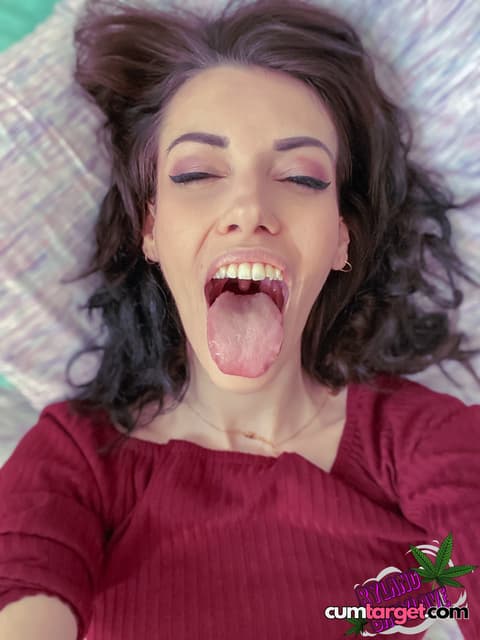 Cum On Playful Woman Sticking Out Tongue