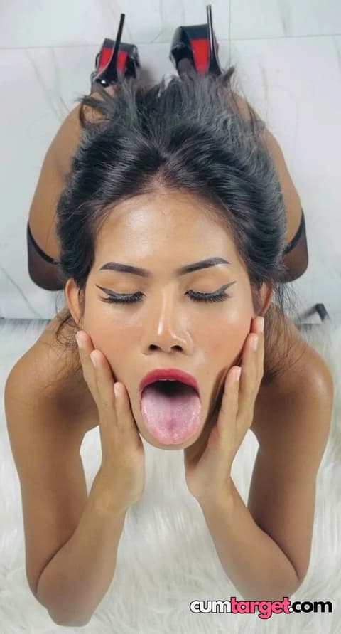 Cum On Woman Posing with Tongue Out