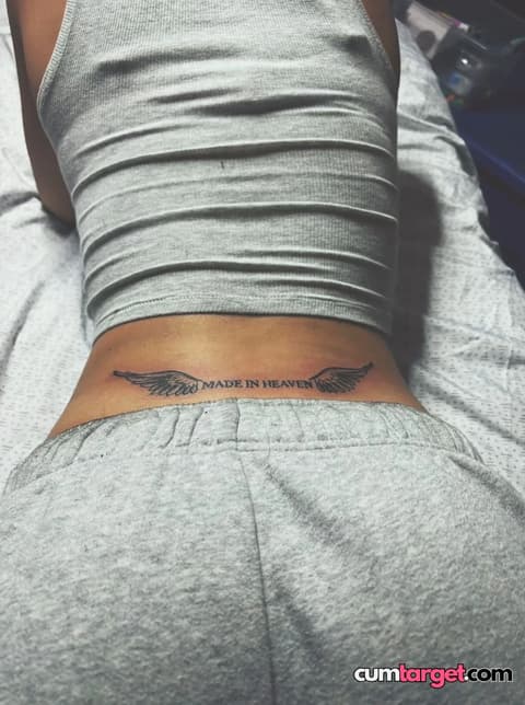 Waiting for Cum Lower Back Tattoo Display