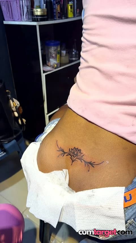 Cum Target Floral Lower Back Tattoo