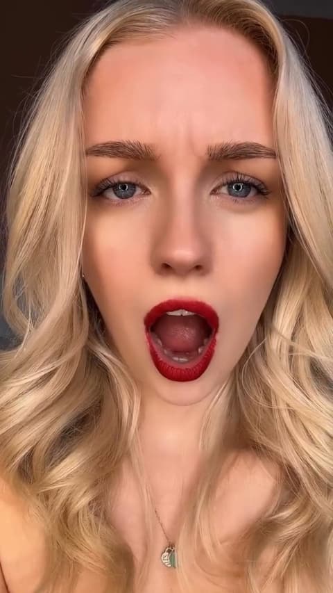 Surprised Woman with Red Lips