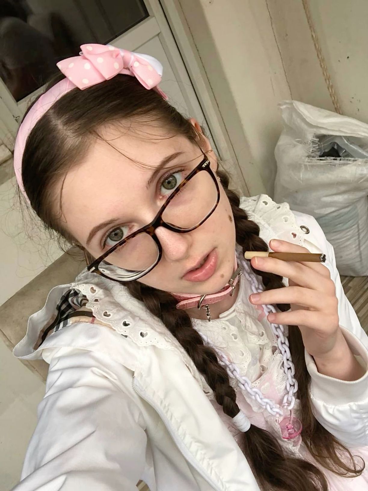Girl with Glasses and Pink Bow