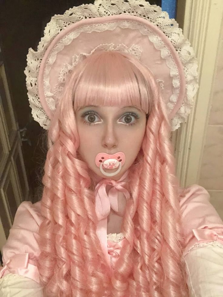 Person in Pink Lolita Outfit