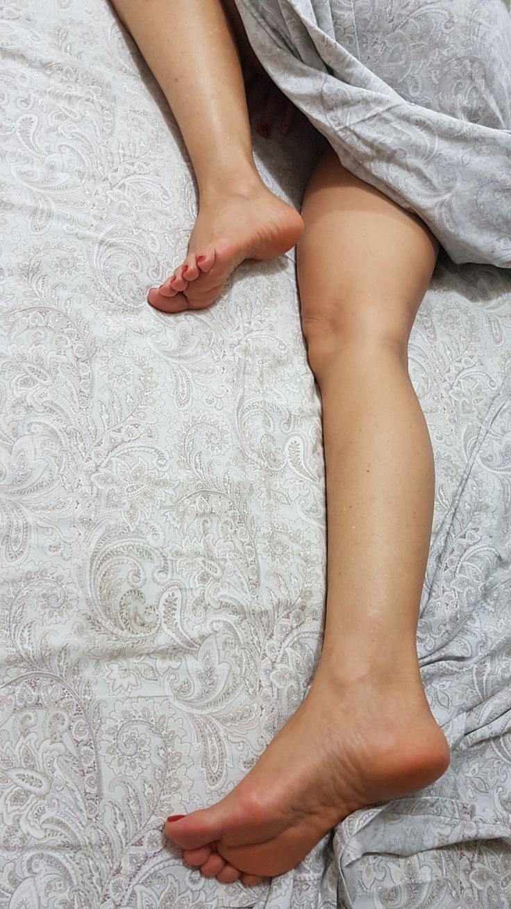 Relaxing Legs on Bed