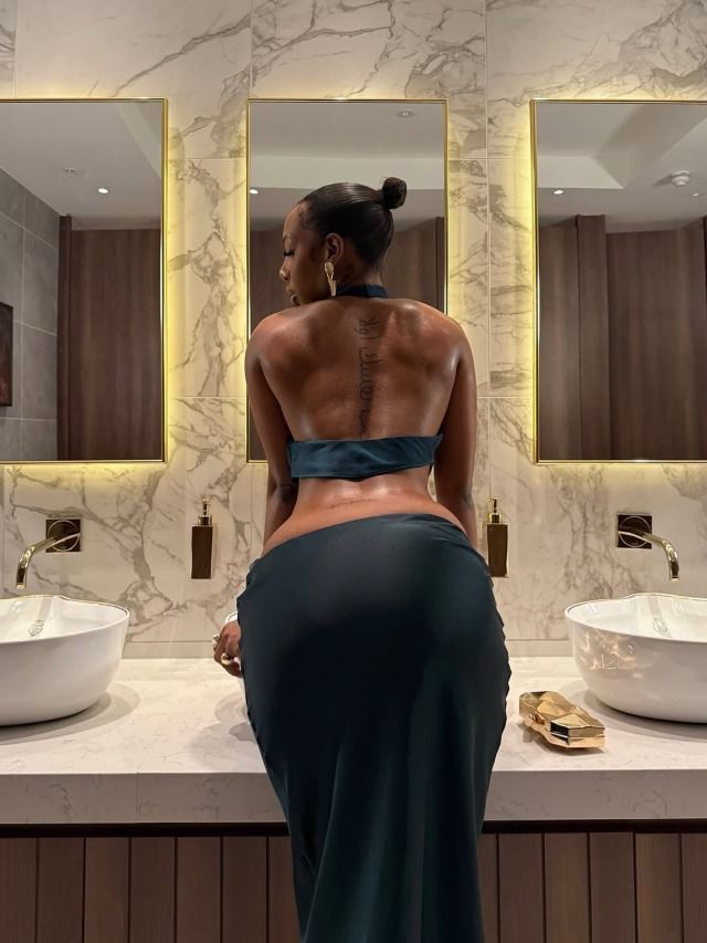 Woman Posing in Elegant Bathroom