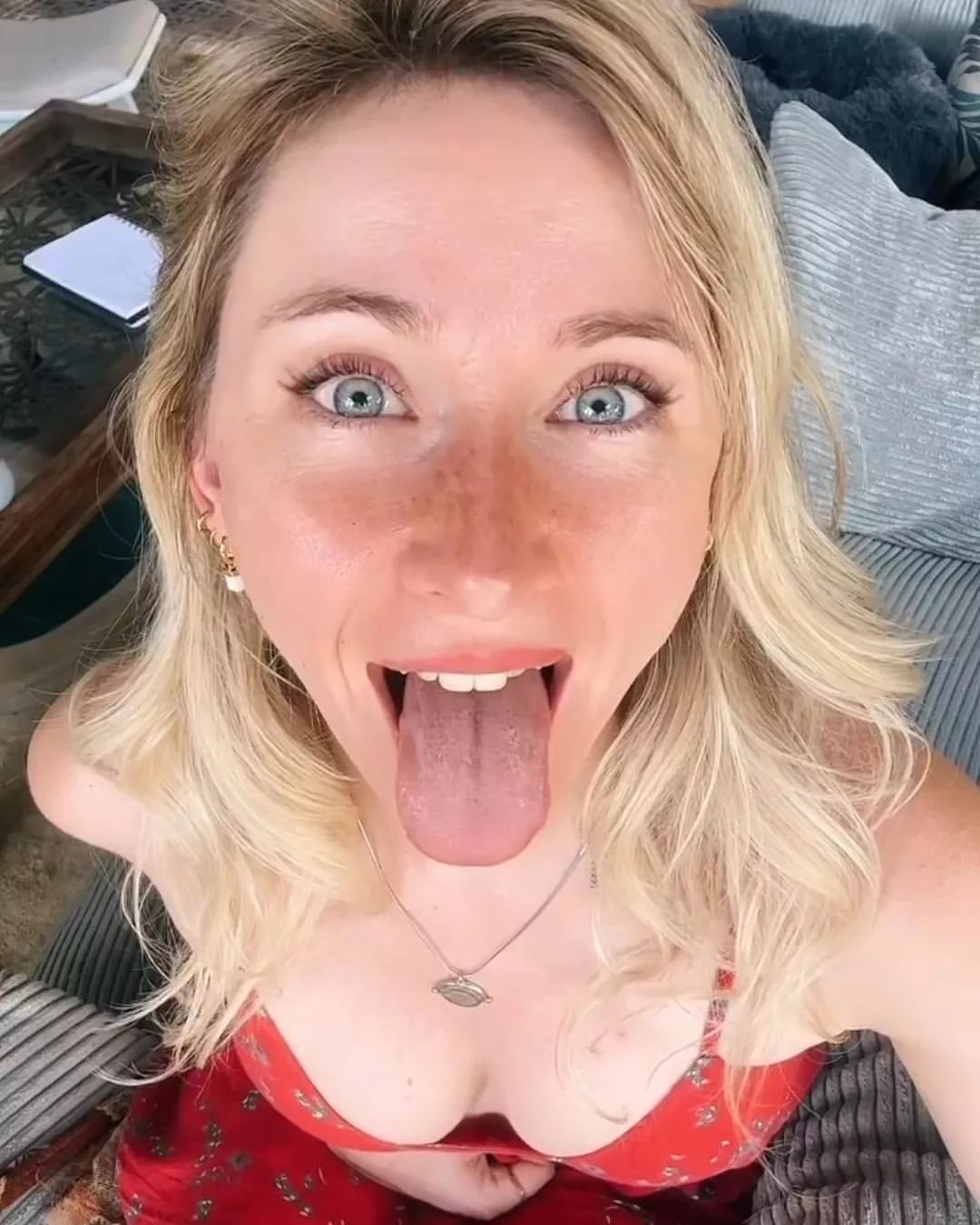 Spray on Spray on Playful Woman Sticking Out Tongue