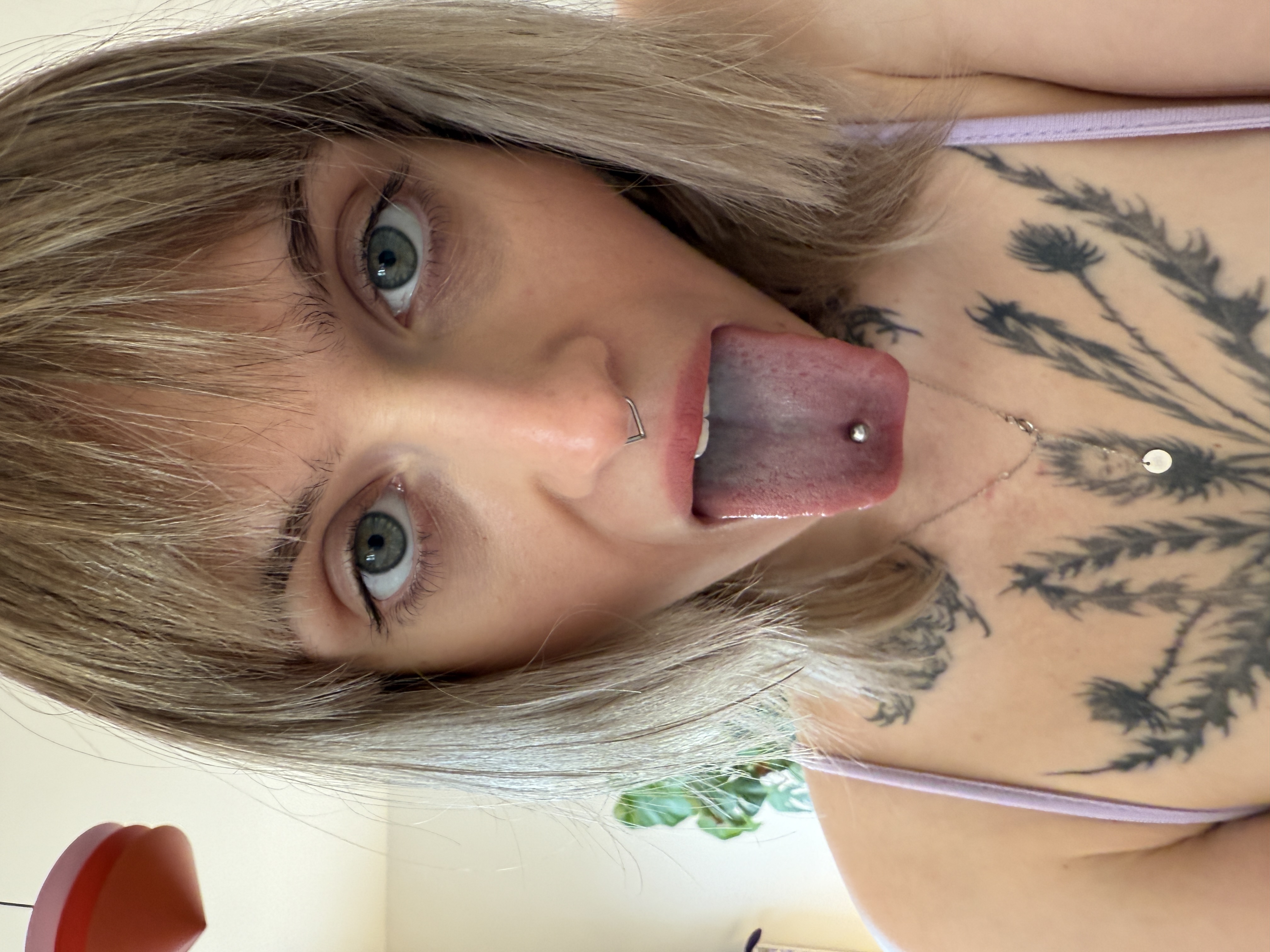 Spray on Spray on Close-up with Tongue Piercing