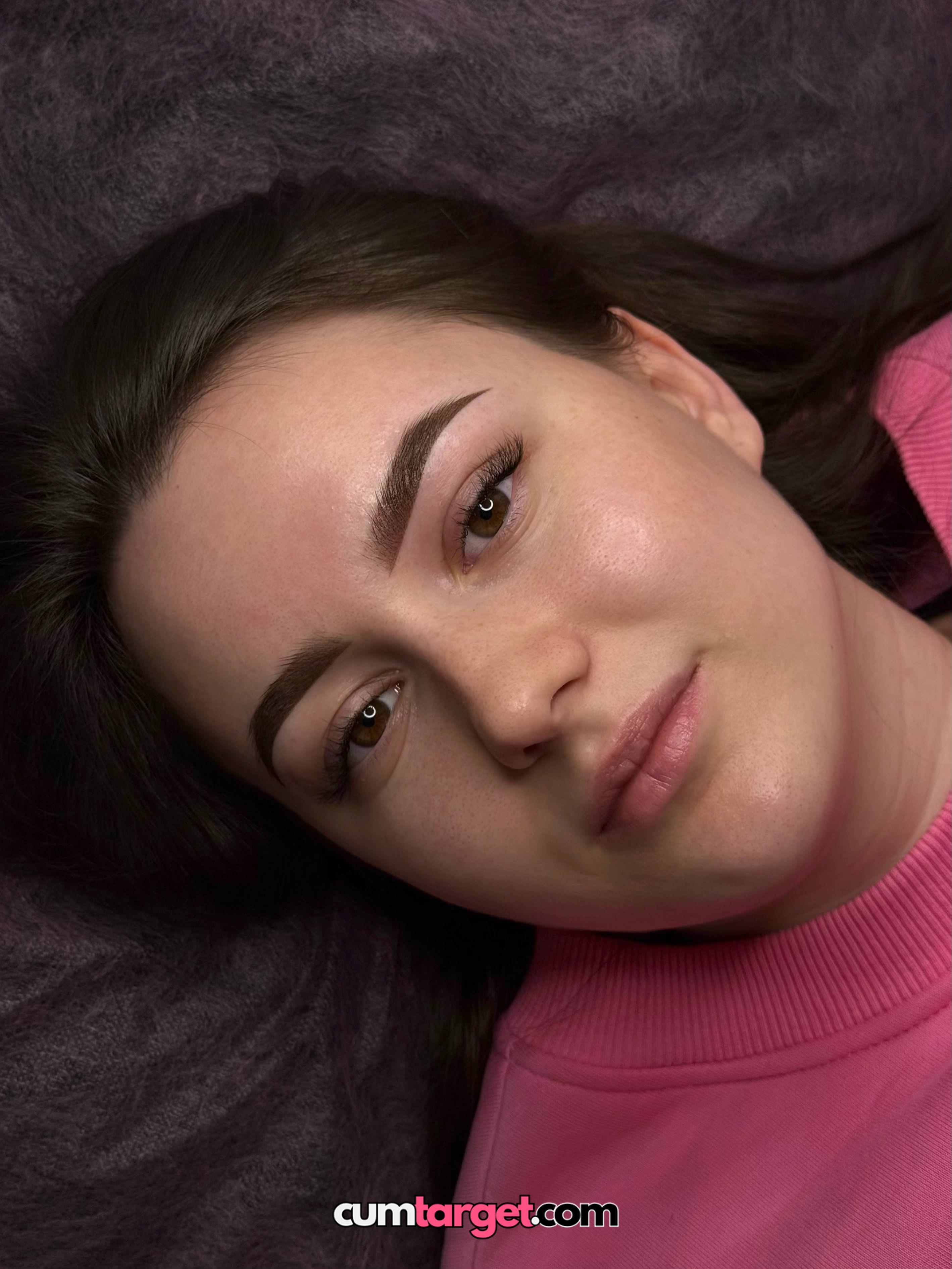 Finish on Spray on Close-up of Woman's Face