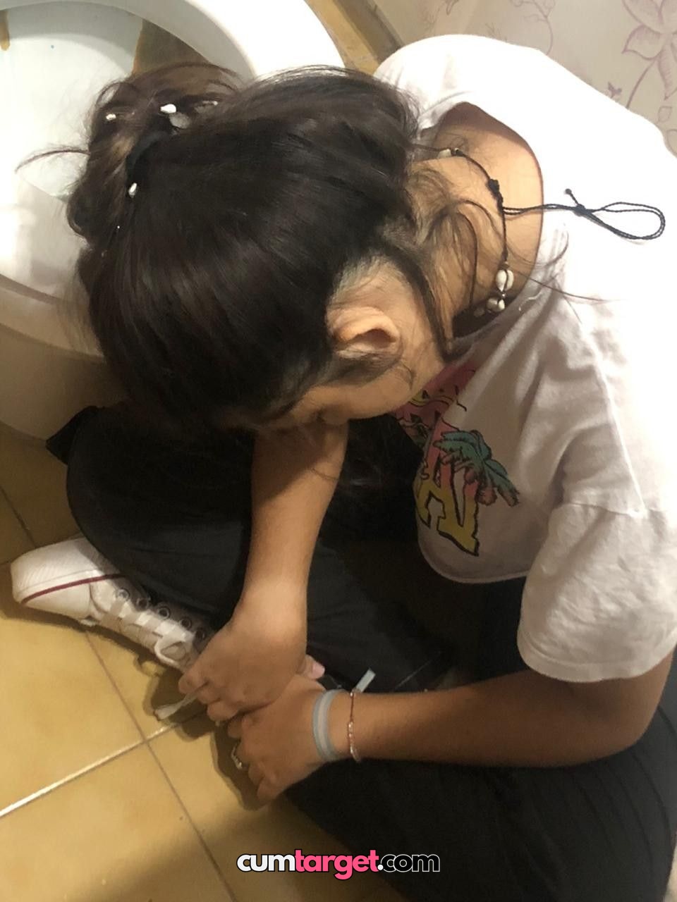 Cum target Cum target Person Sitting on Floor