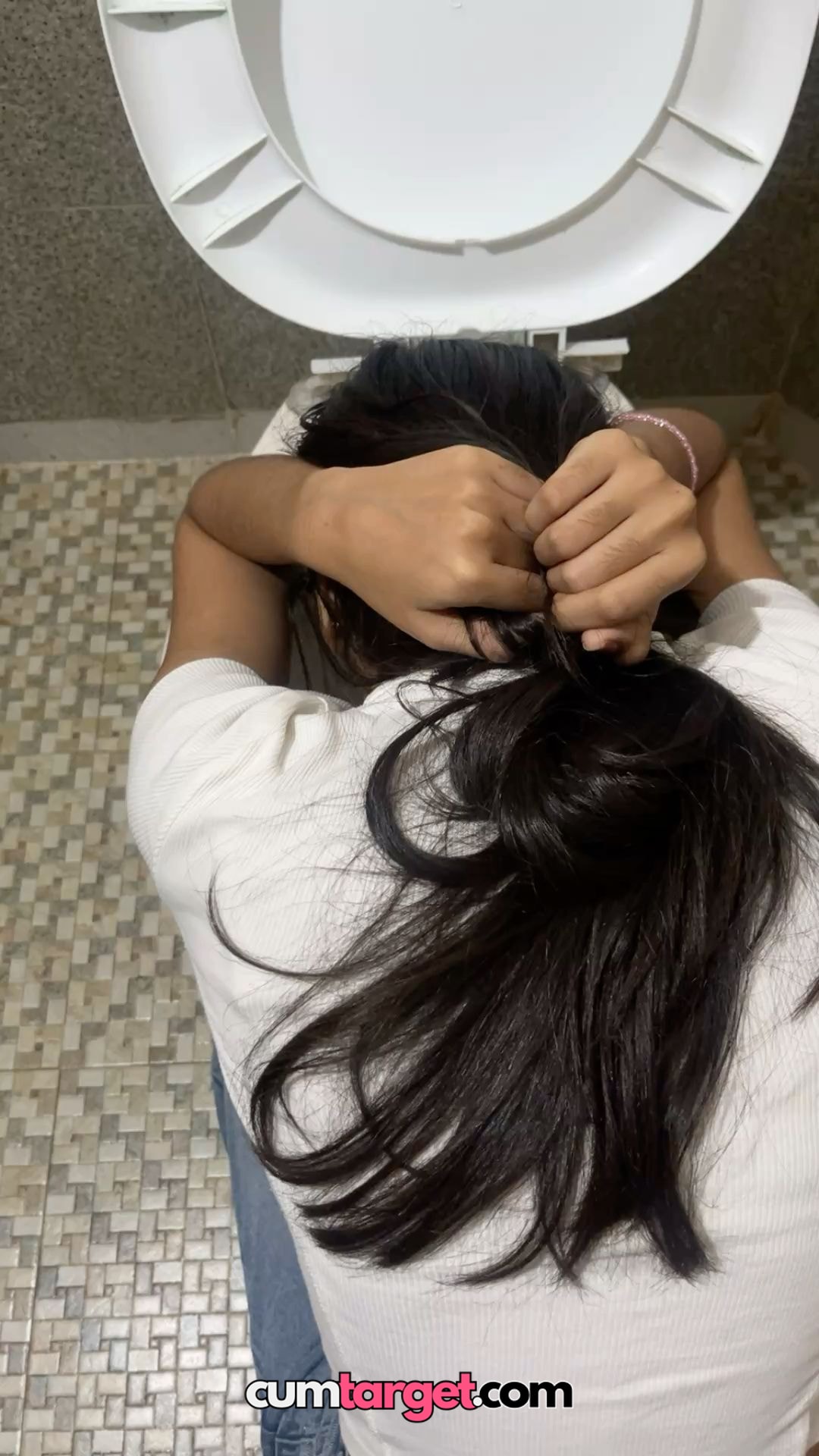 Spray on Spray on Person Leaning Over Toilet